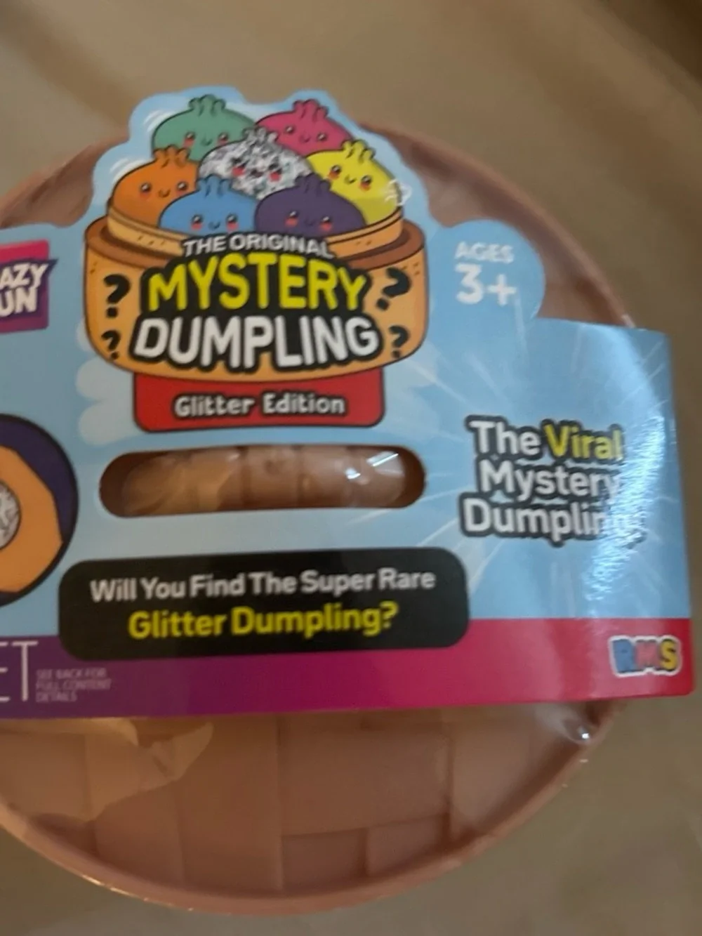 Mystery Dumpling Glitter Edition Surprise Toy - Blue/Yellow/Pink